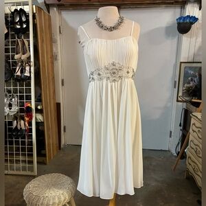 Elegant White Dress with Embellished Waist